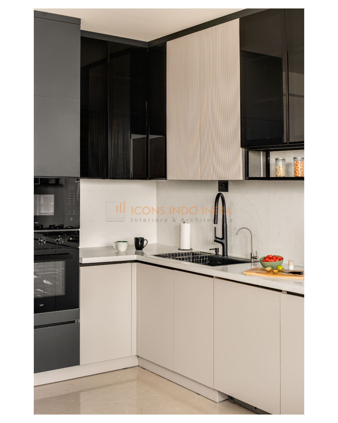 Corner kitchen with high-gloss black uppers, tall built-in ovens and white marble backsplash, Hyderabad bachelor pad