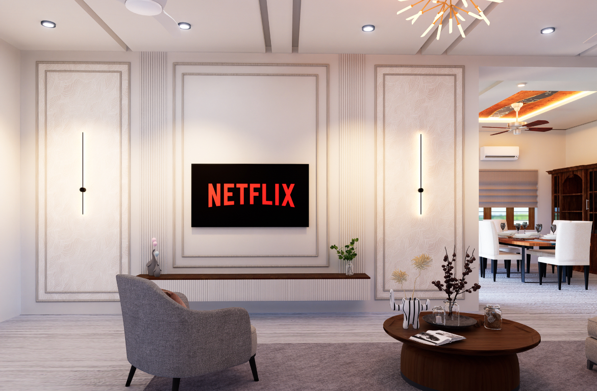 Living room with panelled feature wall, wall-mounted TV, linear lights and round wood table, Hyderabad