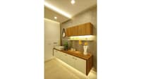 Floating crockery console with wood upper cabinet, white drawers and under-cabinet lighting on a textured wall, Hyderabad