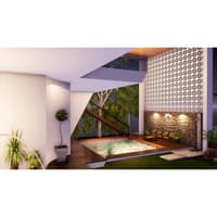 Farmhouse courtyard with plunge pool, white jali screen and stone-clad accent wall on a wood deck, Hyderabad