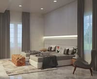 Master bedroom in Hyderabad with fluted headboard, grey floor-to-ceiling drapes, low platform bed and accent armchair