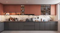 Modular kitchen pairing terracotta upper cabinets with dark grey base units and a marble backsplash, Hyderabad