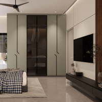 Bedroom with sage and smoked-glass wardrobe, wall-mounted TV on cream panelling and blue checked bedding, Hyderabad