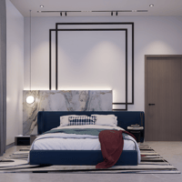 Contemporary bedroom with navy upholstered bed, marble headboard panel, layered black-frame wall trim and striped rug, Hyderabad
