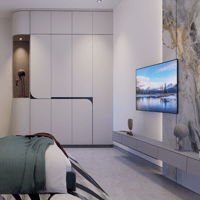 Bedroom with handle-less white wardrobes, wall-mounted TV on a veined marble panel and floating console, Hyderabad