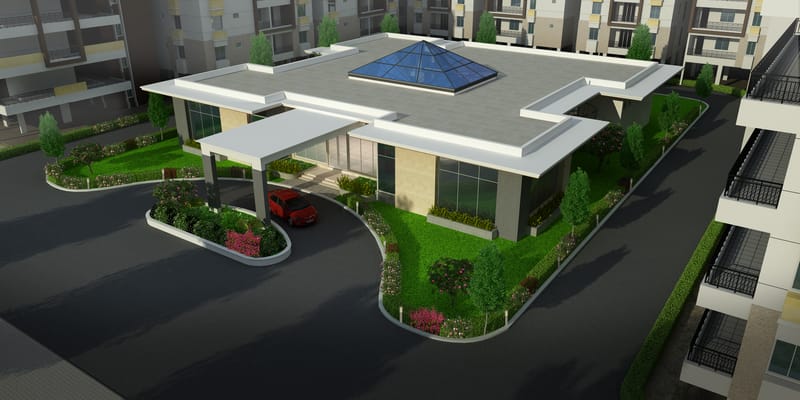 Apartment clubhouse exterior render with skylight roof, landscaped gardens and entry porch among residential blocks, Hyderabad