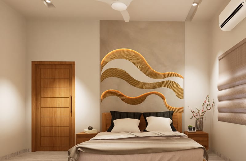 Bedroom with carved golden wave headboard wall, wood wardrobe and warm cove lighting, Hyderabad