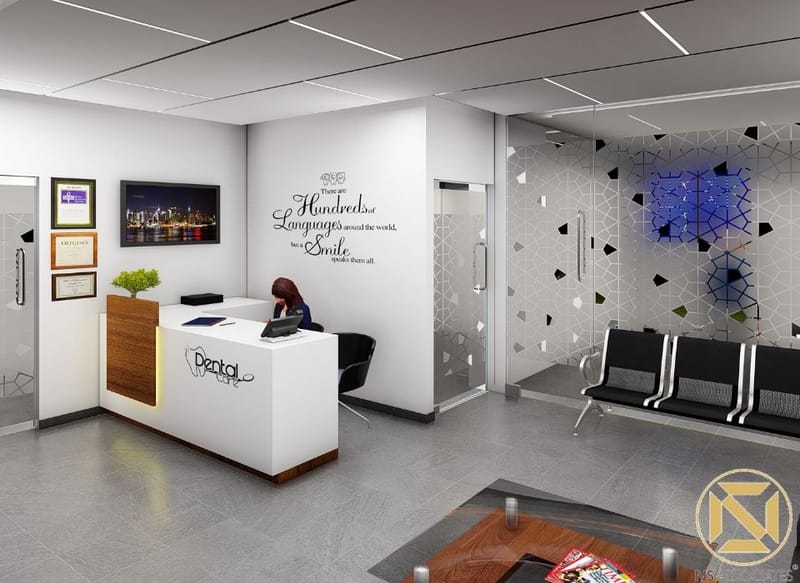 Dental clinic reception with white curved desk, geometric feature wall and waiting chairs, Hyderabad