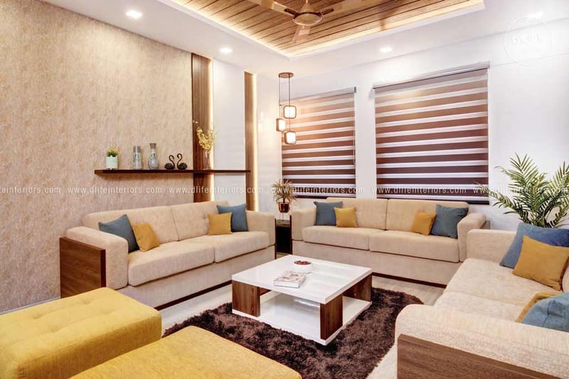 Living room with cream sofas, mustard and teal cushions, wood-slat feature wall and zebra blinds, Hyderabad full home