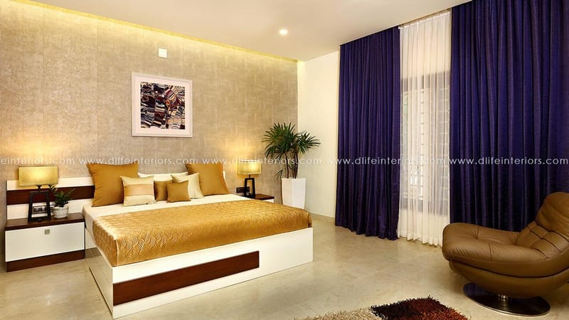 Master bedroom with gold textured wall, white-and-wood platform bed, gold bedspread and deep purple drapes, Hyderabad