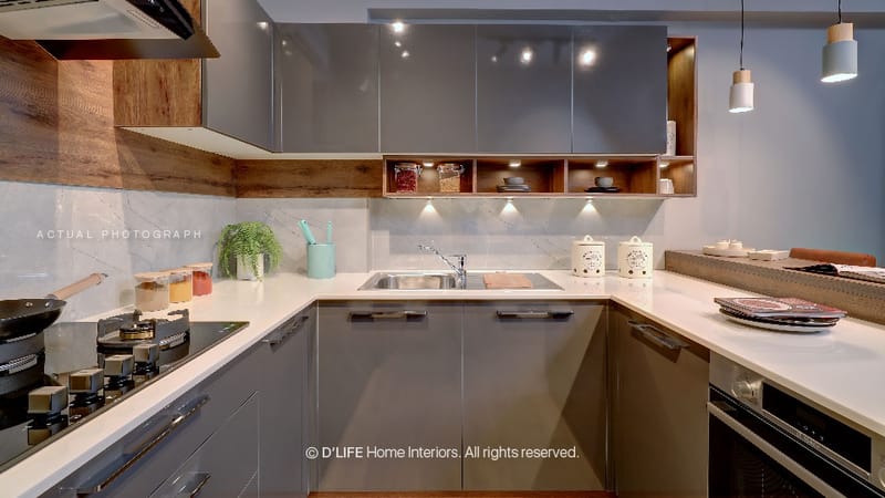 U-shaped modular kitchen with grey gloss cabinets, wood open shelving, white quartz counters and integrated sink, Hyderabad