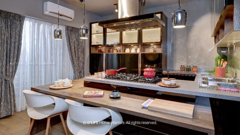 Studio apartment kitchen island with breakfast bar, wood counter, chrome pendant lights and white moulded chairs, Hyderabad