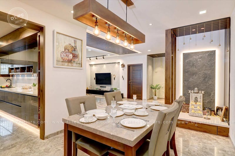 Open dining area with marble-top table, grey chairs and a wood-framed pendant over the TV lounge, Hyderabad full home