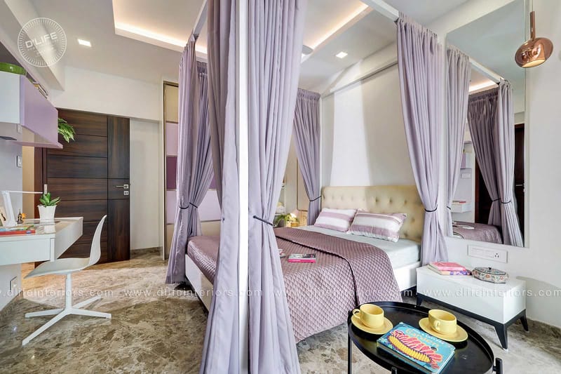 Girl's bedroom with lilac four-poster drapes, mirrored wardrobe and white study desk on marble flooring, Hyderabad full home