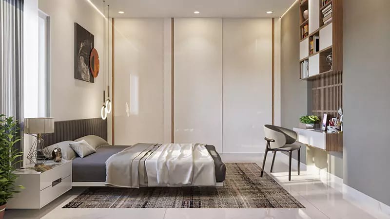 Minimal bedroom with grey upholstered bed, glossy white wardrobe, floating study desk and open wood shelving, Hyderabad