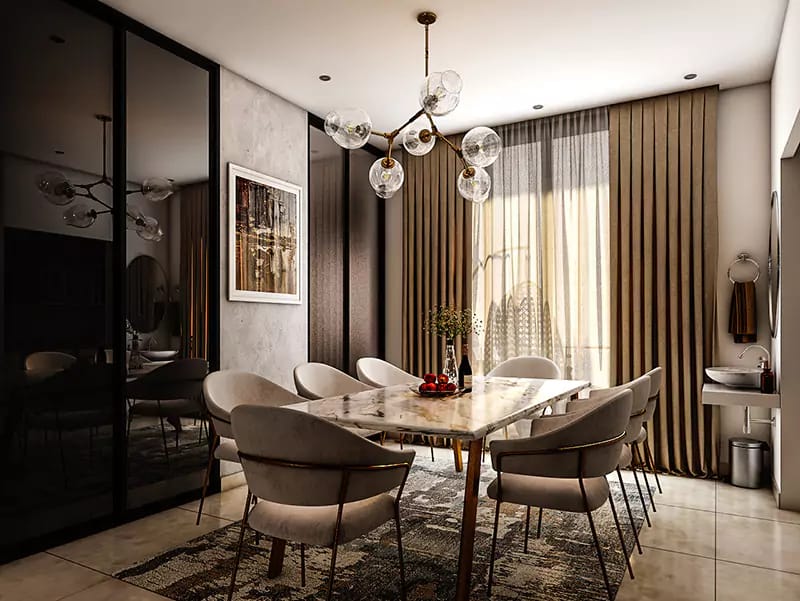 Dining room with marble-top table, beige curved chairs, glass-bubble chandelier and floor-length drapes, Hyderabad