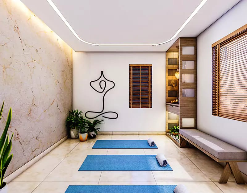 Home yoga and meditation room with blue mats, marble accent wall and wire meditation figure wall art, Hyderabad