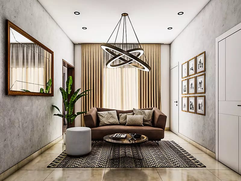 Compact living room with brown sofa, halo ring chandelier, framed photo wall and patterned rug, Hyderabad
