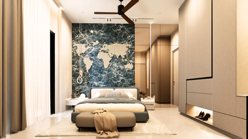 Bedroom with green-marble world-map feature wall behind an upholstered bed, fluted wardrobes and a long bench, Hyderabad