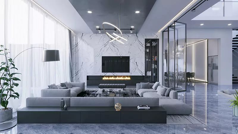 Living room with marble TV wall, linear fireplace, grey sectional sofas and glass display unit, Hyderabad
