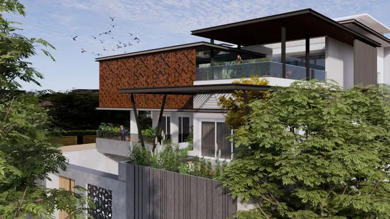 Contemporary Hyderabad house render featuring a perforated corten screen wall, deep overhanging roof and planted glass balcony framed by greenery