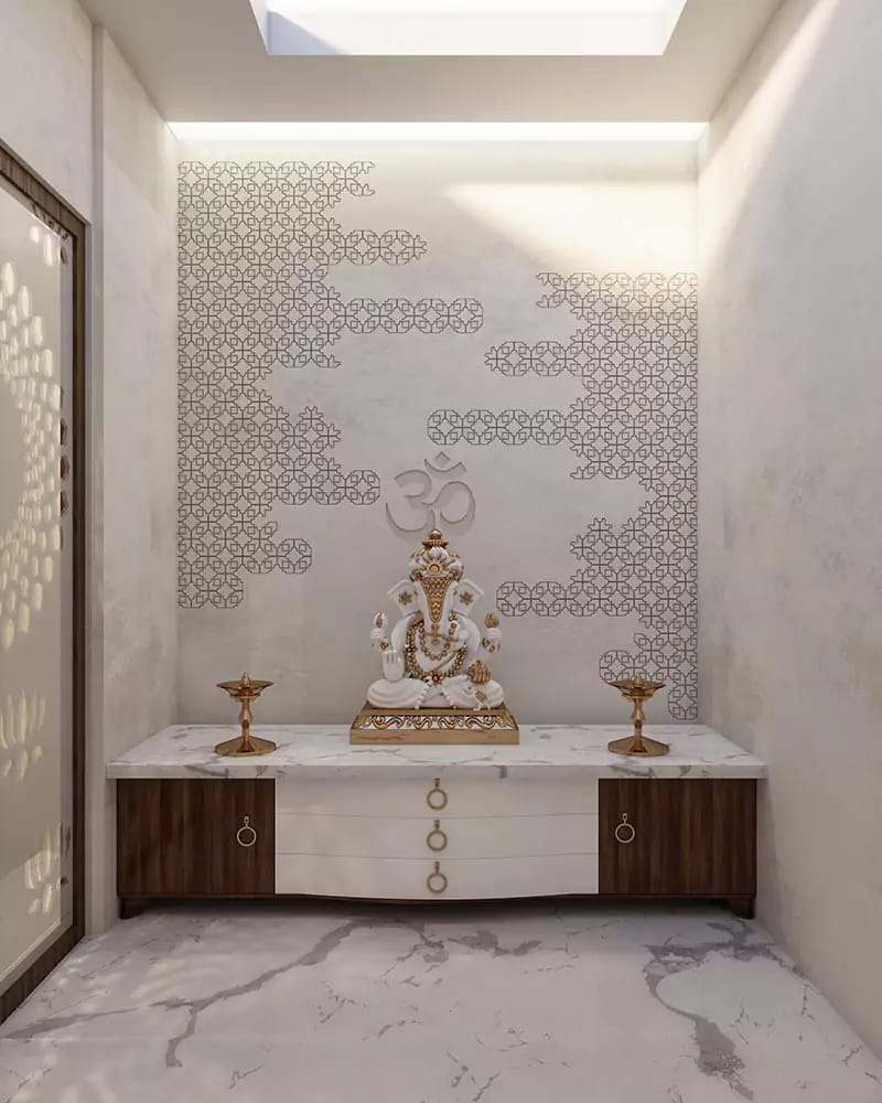 Pooja room with Ganesha idol, gold filigree wall motif, Om symbol skylight and marble-clad altar, Hyderabad