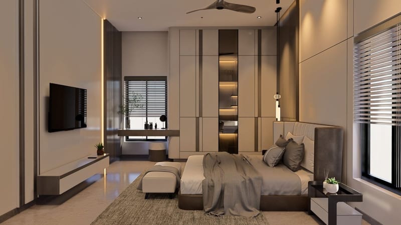 Modern master bedroom in Hyderabad with wall-mounted TV, panelled wardrobe and beige upholstered bed on a textured rug