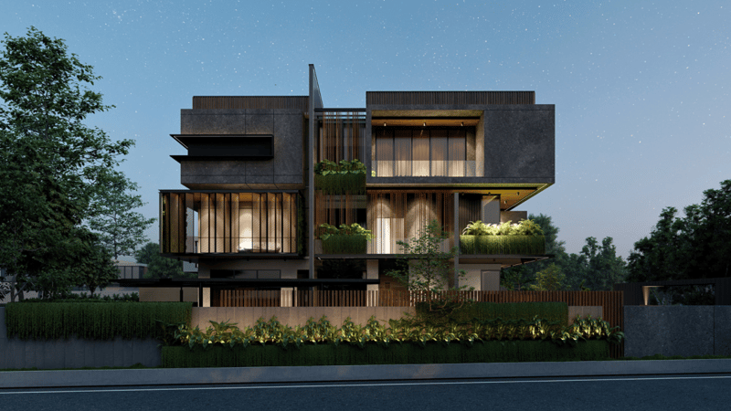 Night view of a concrete-and-timber villa with green balcony planters and a landscaped street-edge hedge
