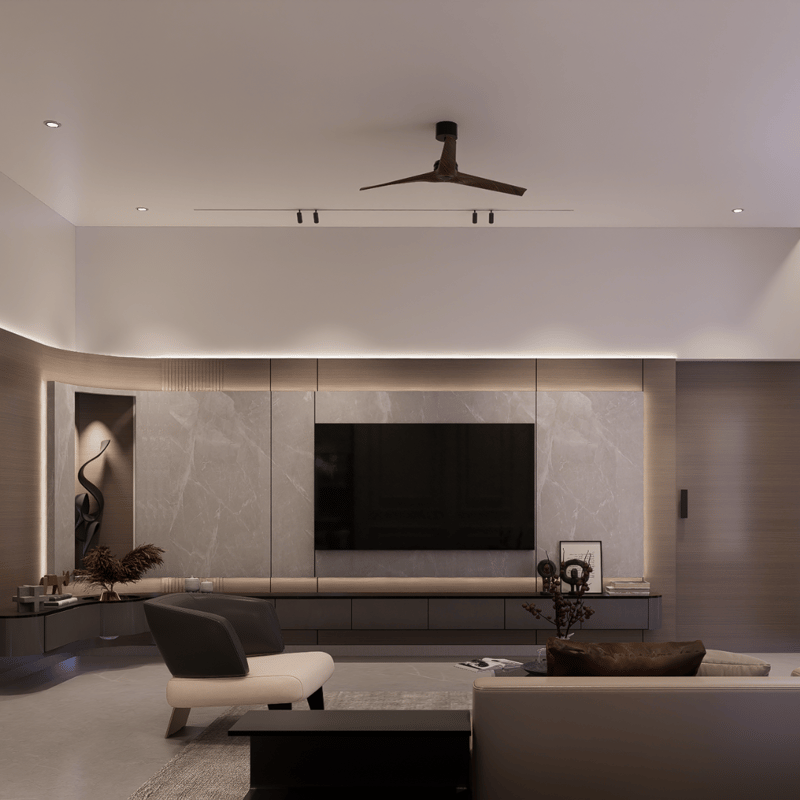 Dimly lit modern living room with a marble TV feature wall, low media unit and minimalist seating, Hyderabad
