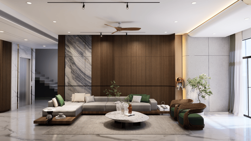 Open-plan living room in Hyderabad with grey L-shaped sofa, wood-slat and marble feature wall and marble coffee table