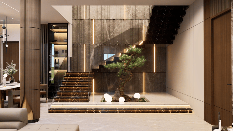 Floating wood staircase with bonsai planter and stone backdrop in a double-height foyer, contemporary Hyderabad villa