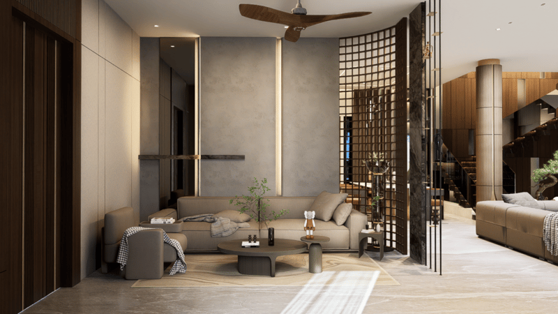 Calm contemporary living room in Hyderabad with low taupe sofas, stone walls, lattice screen and round coffee tables