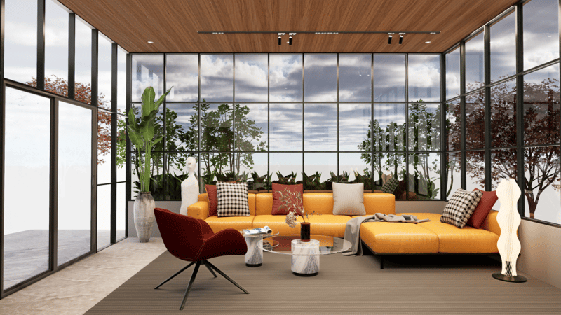 Sunlit lounge wrapped in floor-to-ceiling glass with a long mustard sofa, terrace greenery and wood-slat ceiling, Hyderabad
