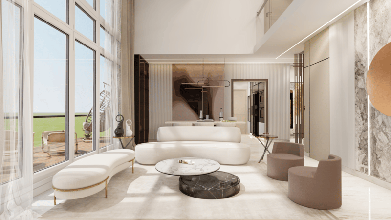 Cream curved sofa and round marble coffee tables in a sunlit minimalist living room with marble accent wall, Hyderabad