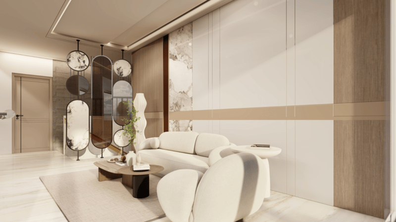 Minimalist living room with curved cream sofas, round marble coffee table, mirrored screen divider and wood-panel marble-inlay wall, Hyderabad