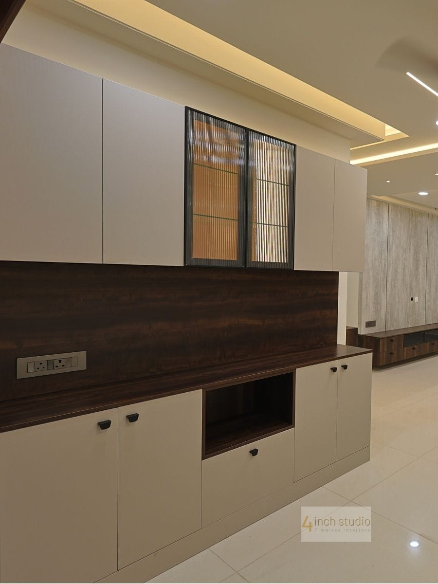 Crockery cabinet with white shutters, fluted-glass uppers, dark woodgrain back panel and open niche, Hyderabad home