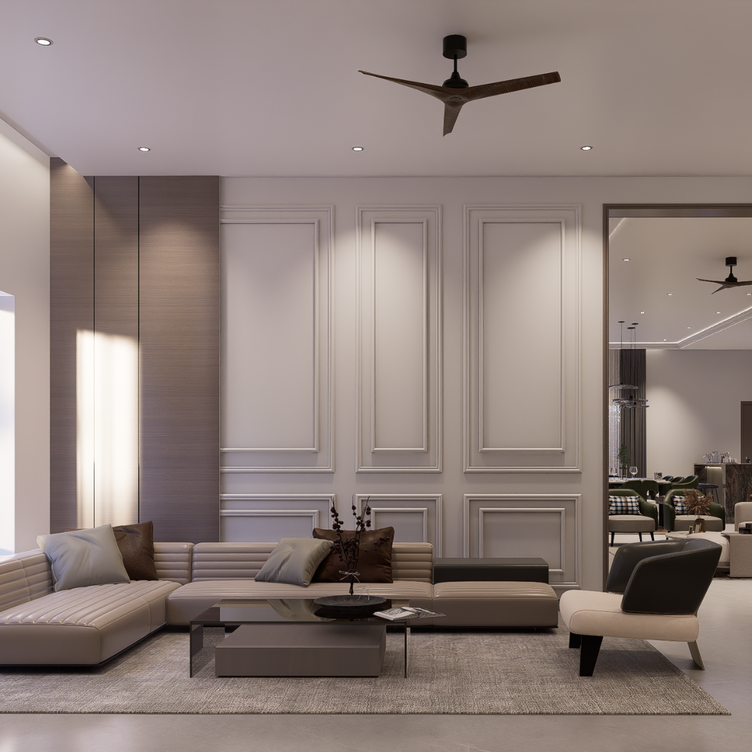 Living room with white wainscot wall panelling, low grey sectional sofa and a pale area rug, Hyderabad